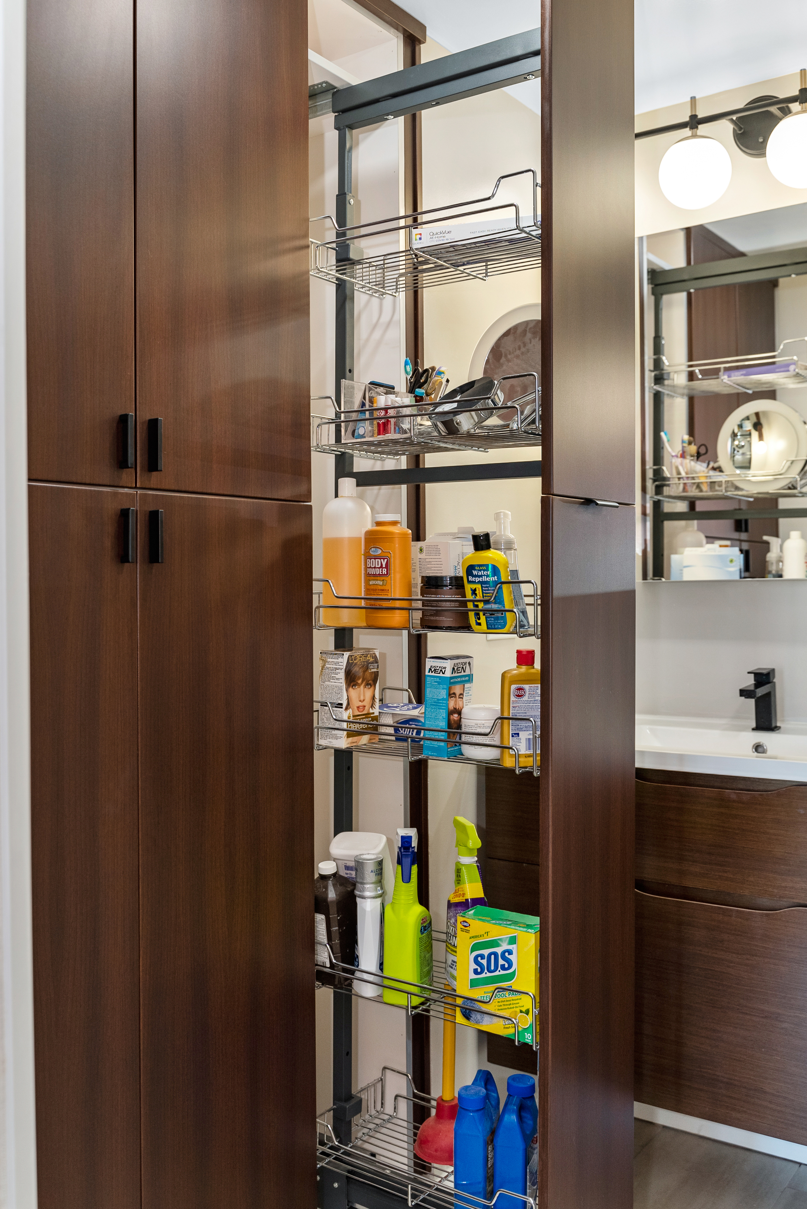 Pull-out pantry cabinet with wire shelves for organized storage