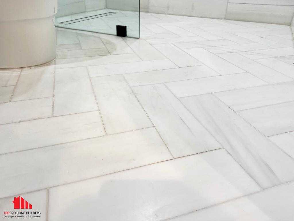 Bathroom floor with herringbone pattern