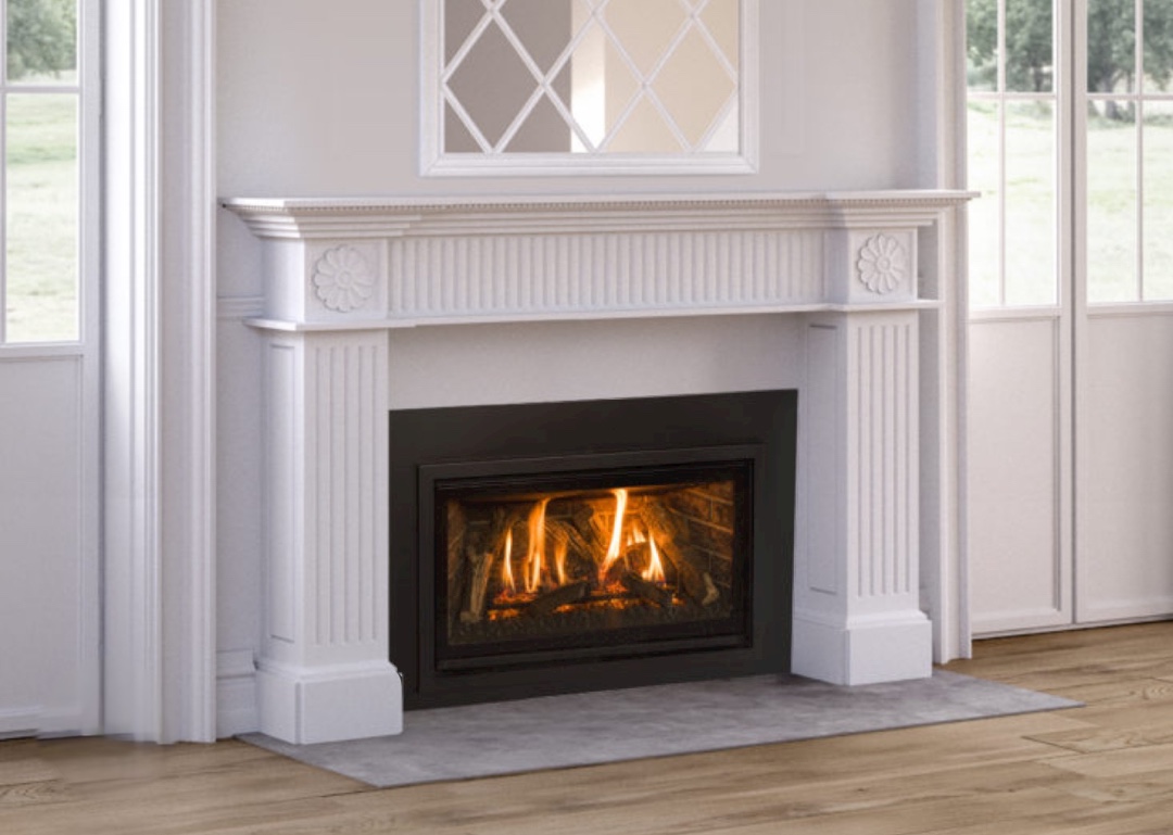 High-efficiency gas fireplace installation featuring ornate mantel