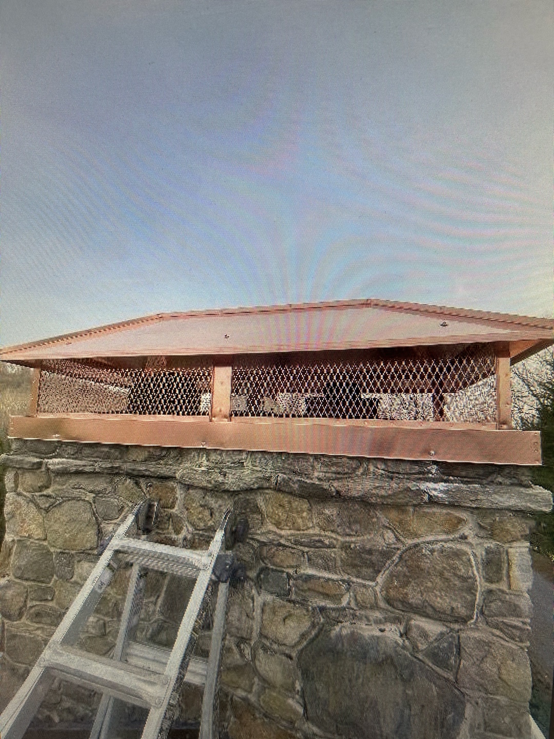 Copper cap installed on stone structure