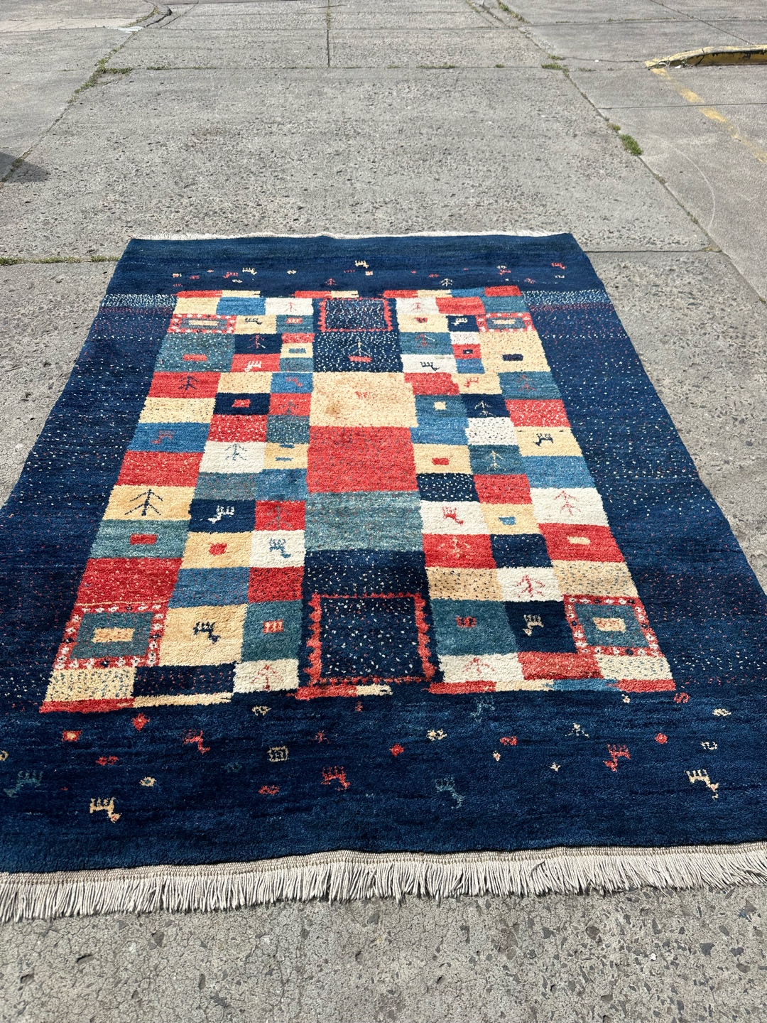 Before cleaning - A colourful but dull rug
