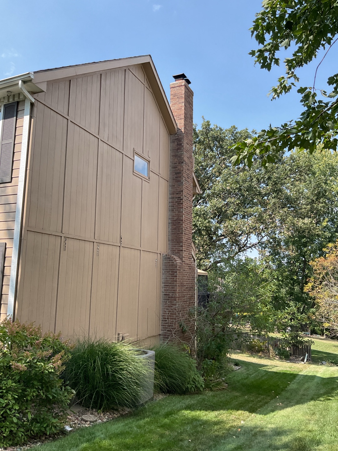 Exterior view of Tom's home showcasing its well-maintained structure