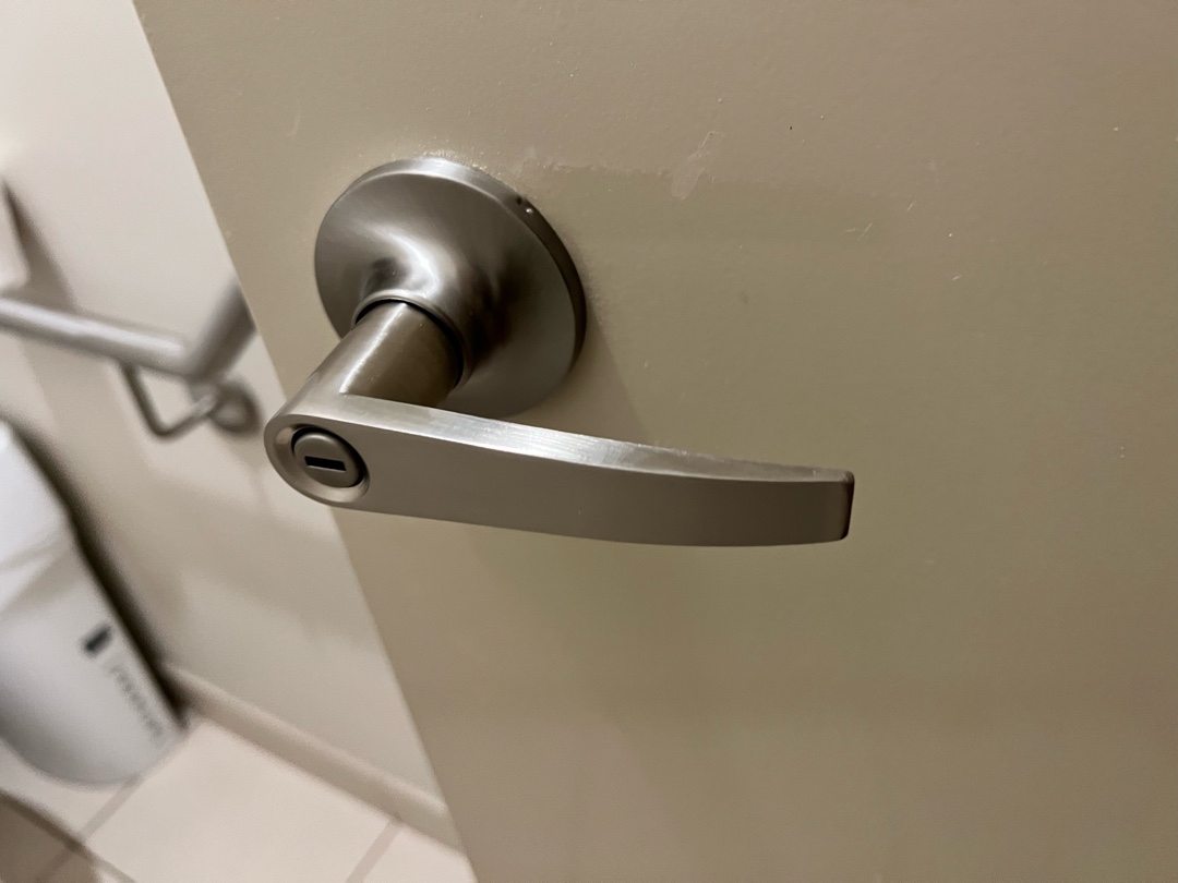 Privacy lever handle installed on an indoor door