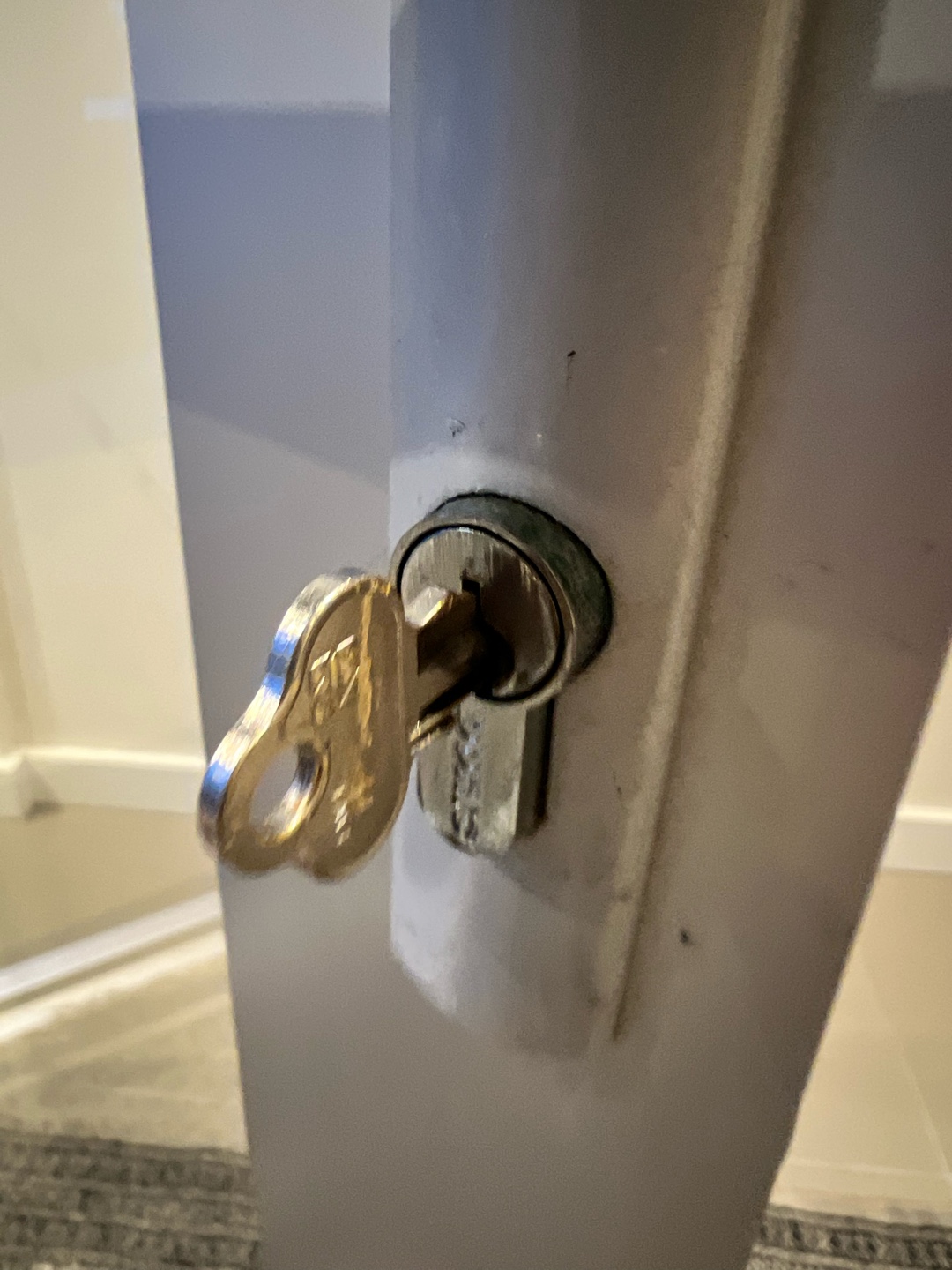 Close-up view of a key broken off in a lock