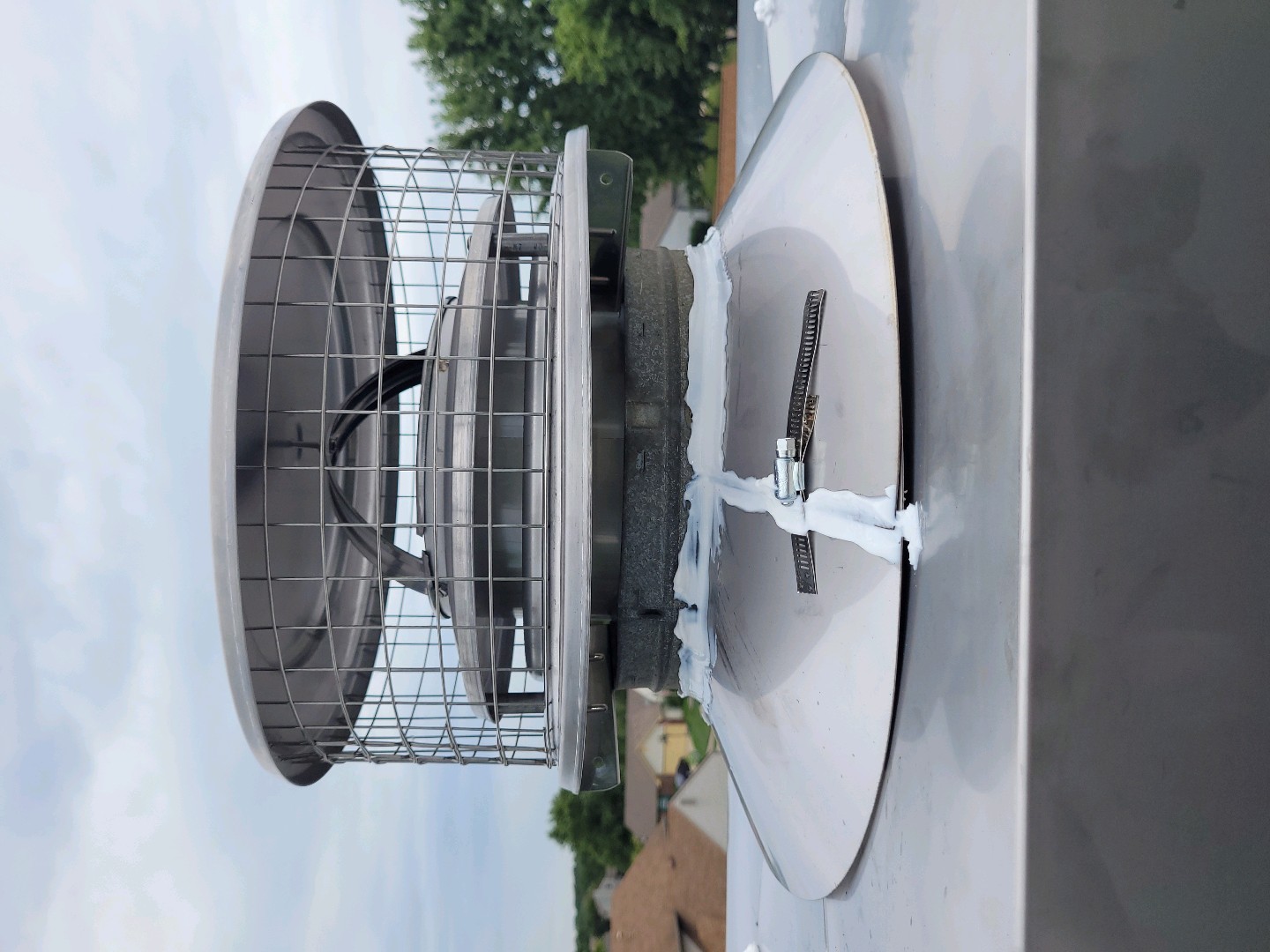 Newly installed metal chimney cap