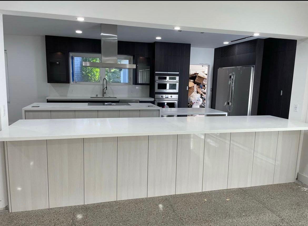 Modern kitchen with large white island countertop