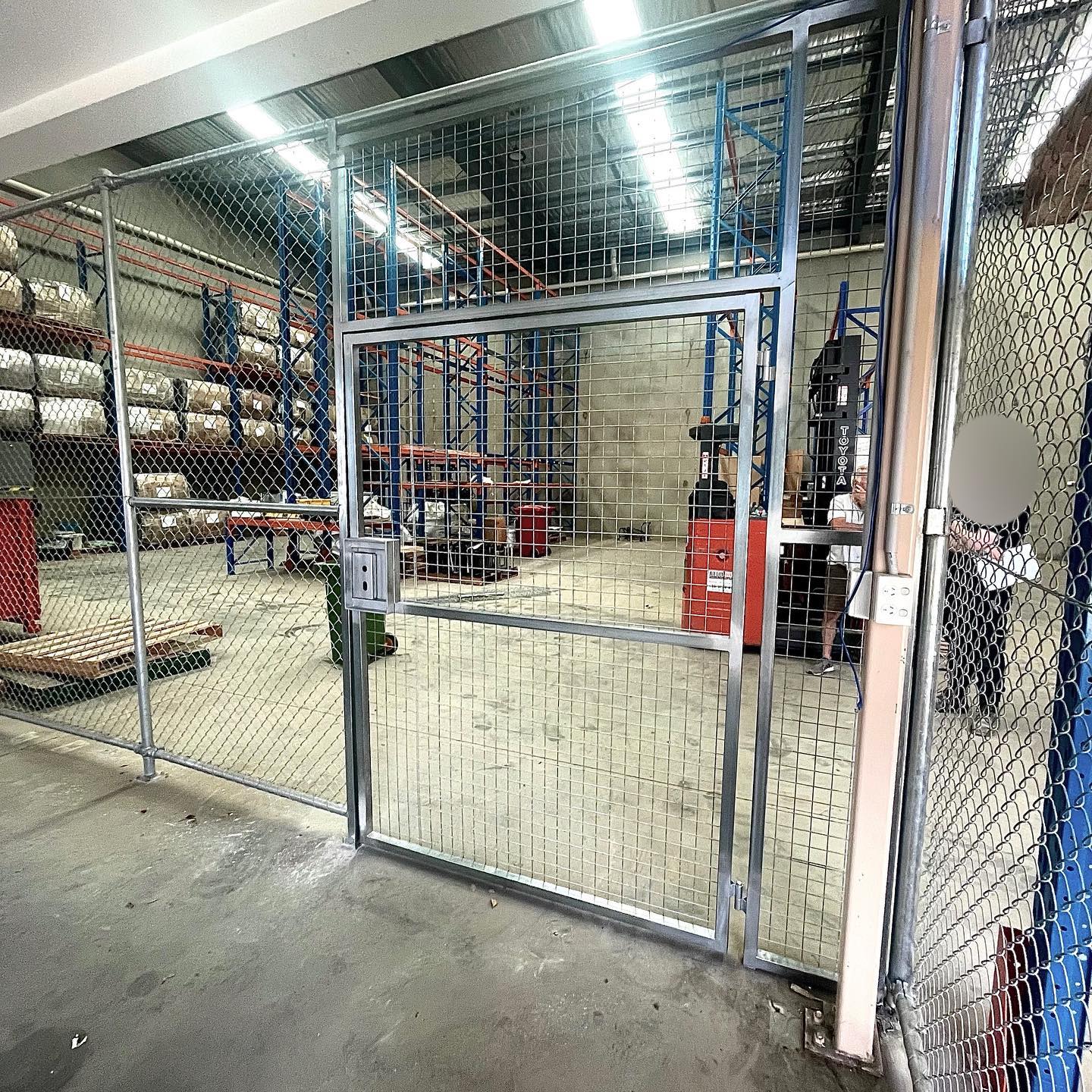 Warehouse environment with installed security fence