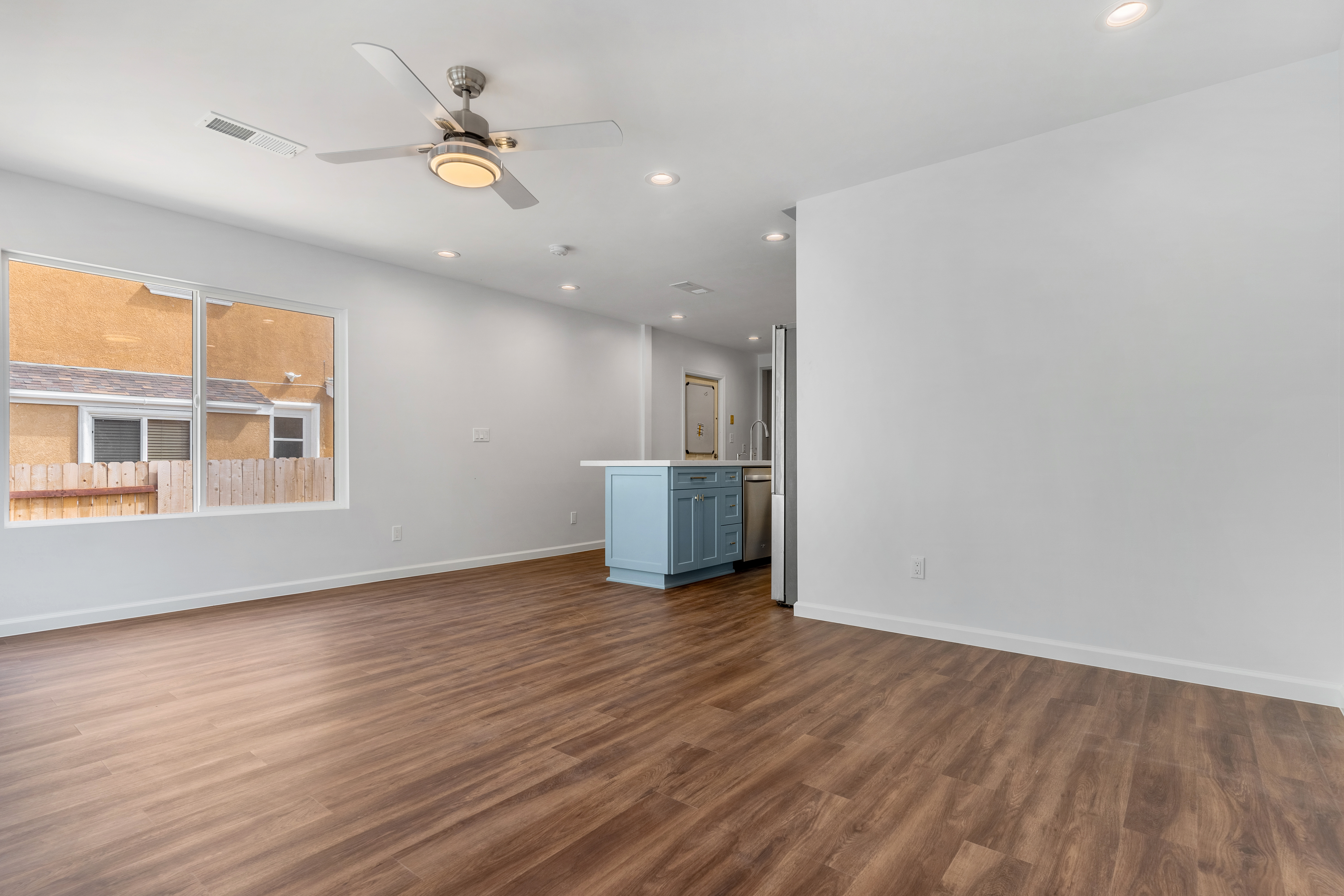 Spacious room with wooden flooring