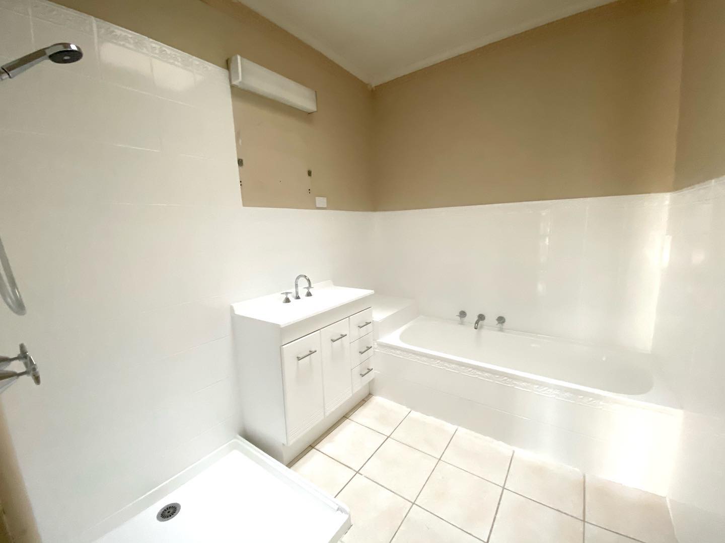 Newly renovated bathroom with white sink