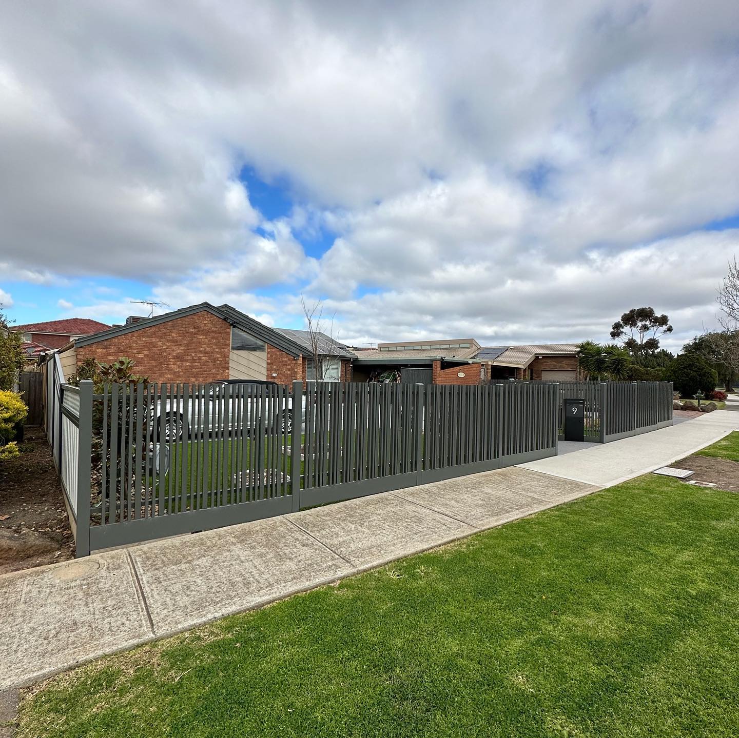 Modern fence with alternating pattern