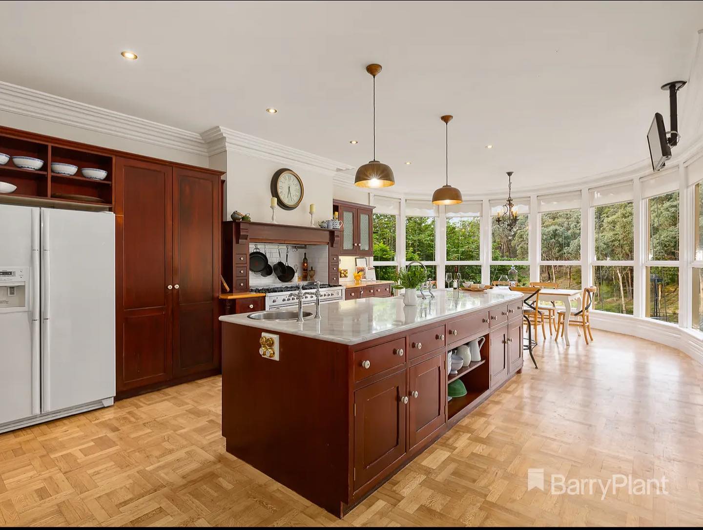 Modernized kitchen with wooden cabinetry