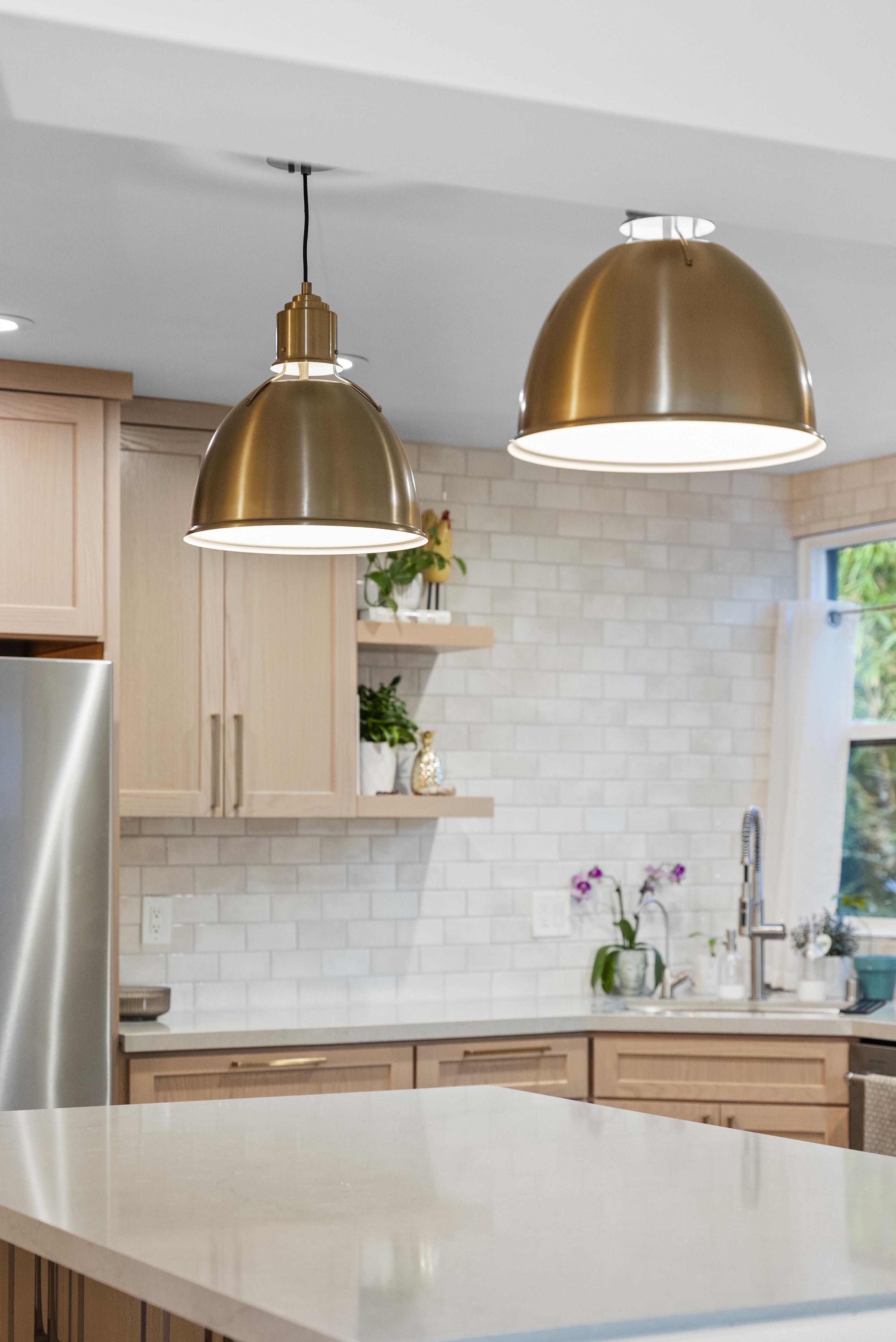 Stylish pendant lights hanging over an island