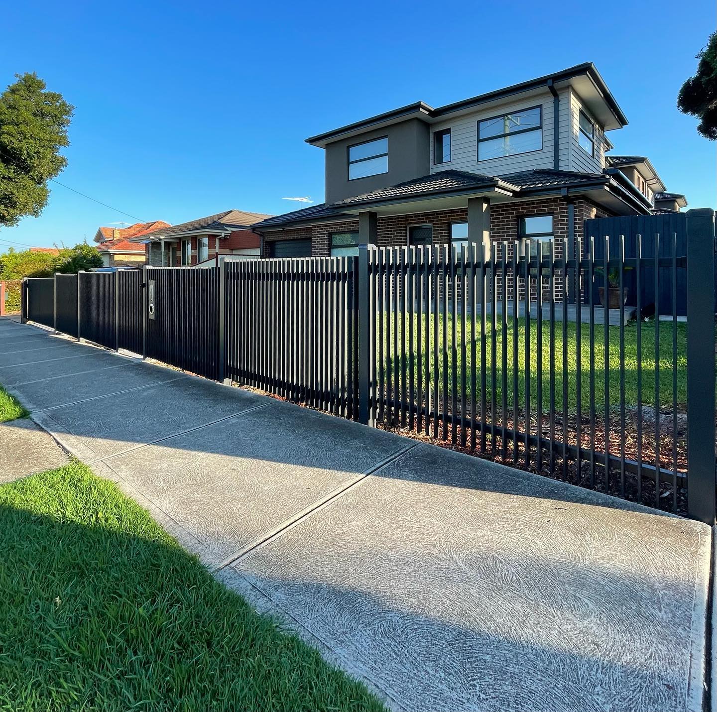 Successful Blade Fence Installation in Airport West: Impressive Results Speak for Themselves! 5 Residential property with newly installed black blade fence