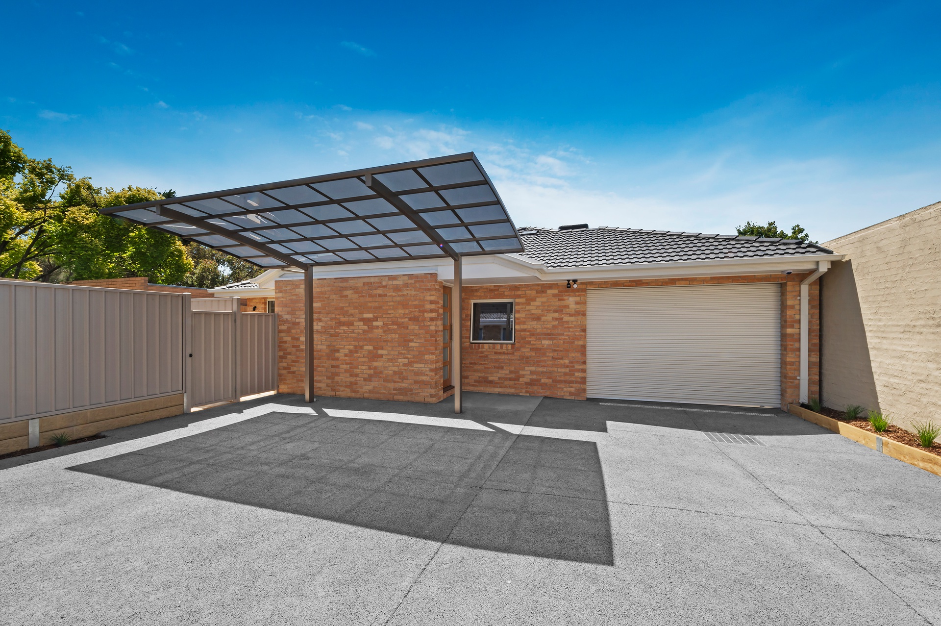 Single-story brick house with double car garage