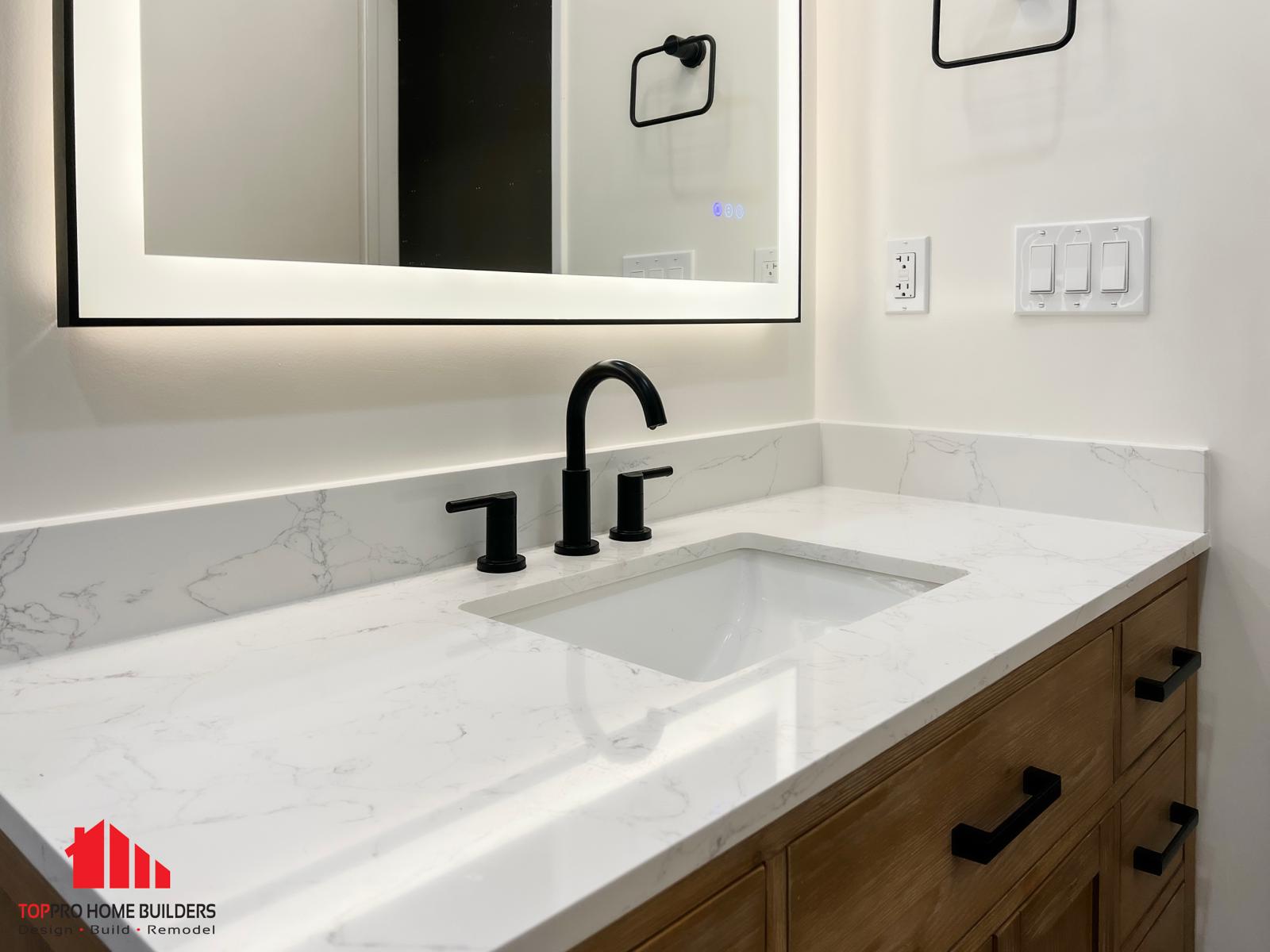 Modern bathroom vanity with white marble countertop