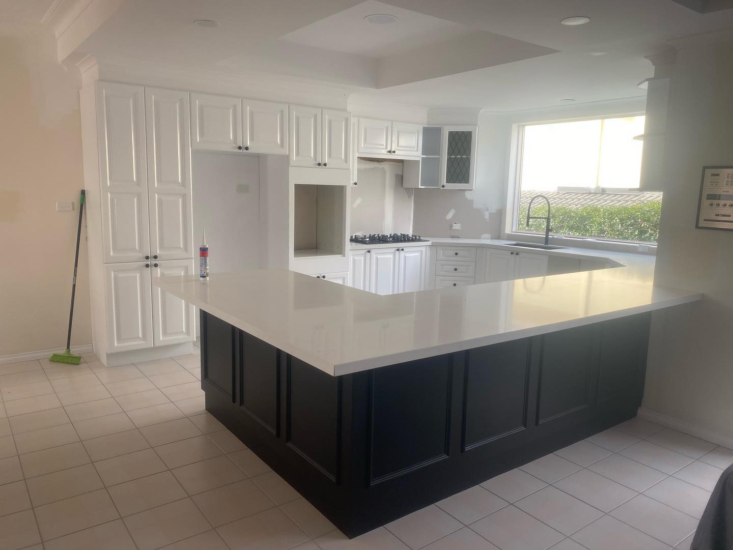 Large kitchen island with white countertop
