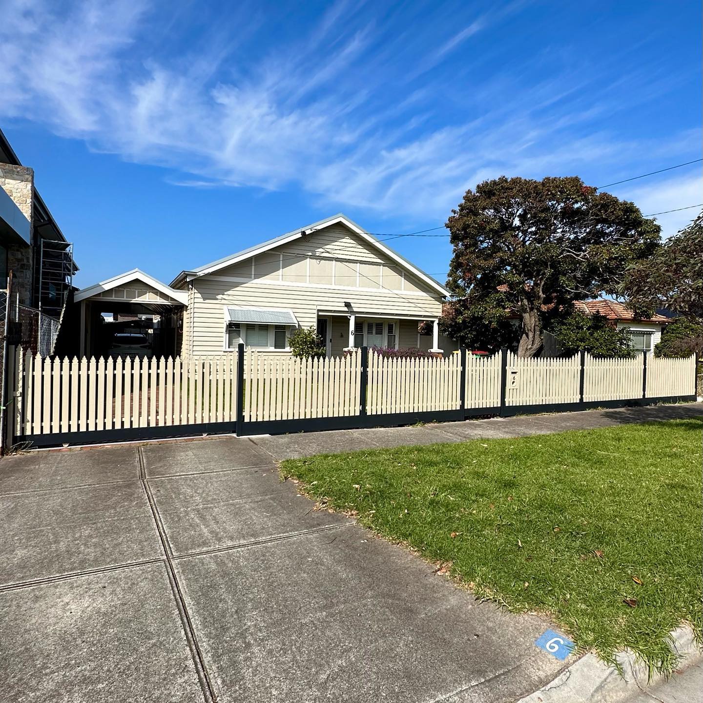 Close-up view of the picket style fence