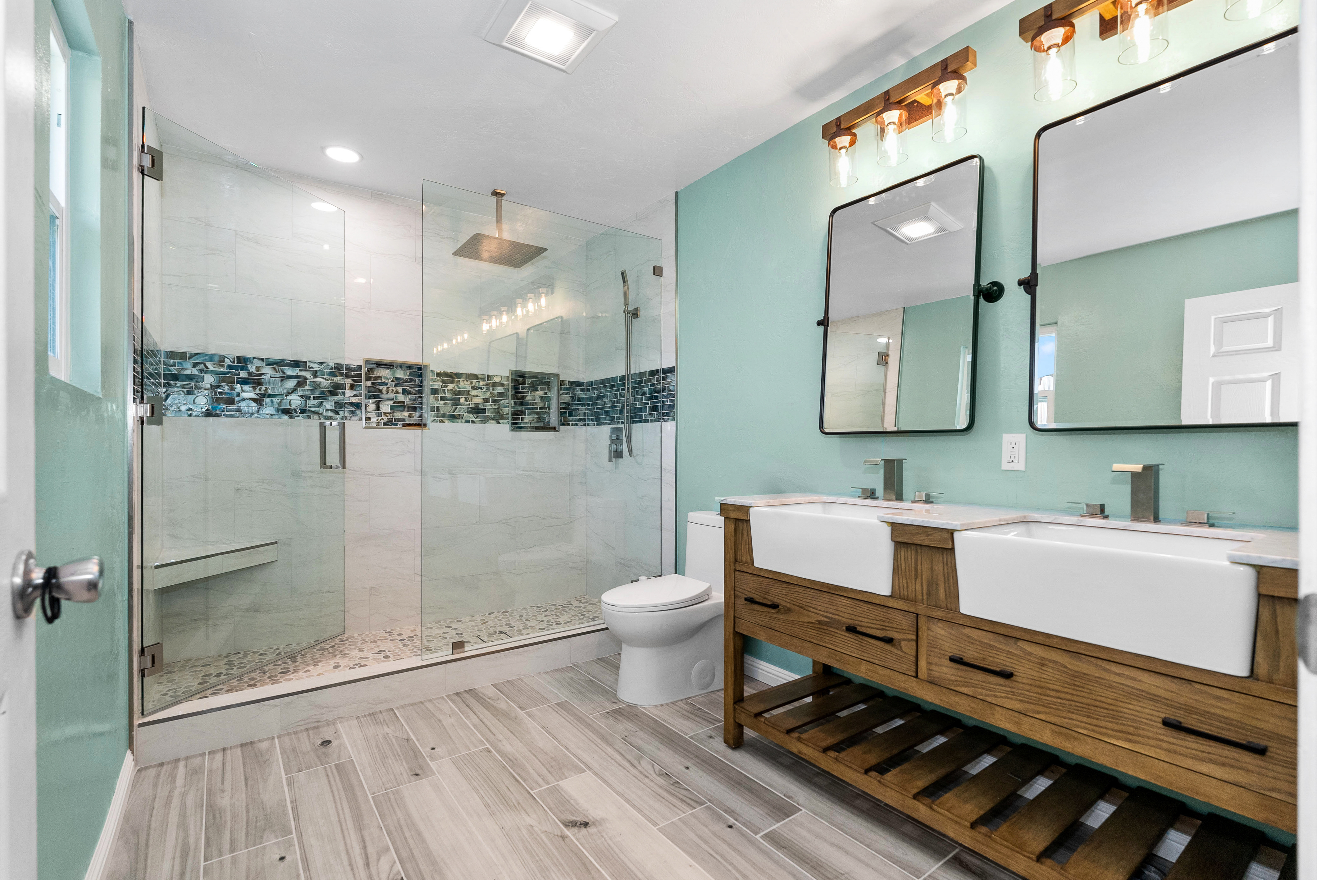 Modern bathroom with large glass-enclosed shower