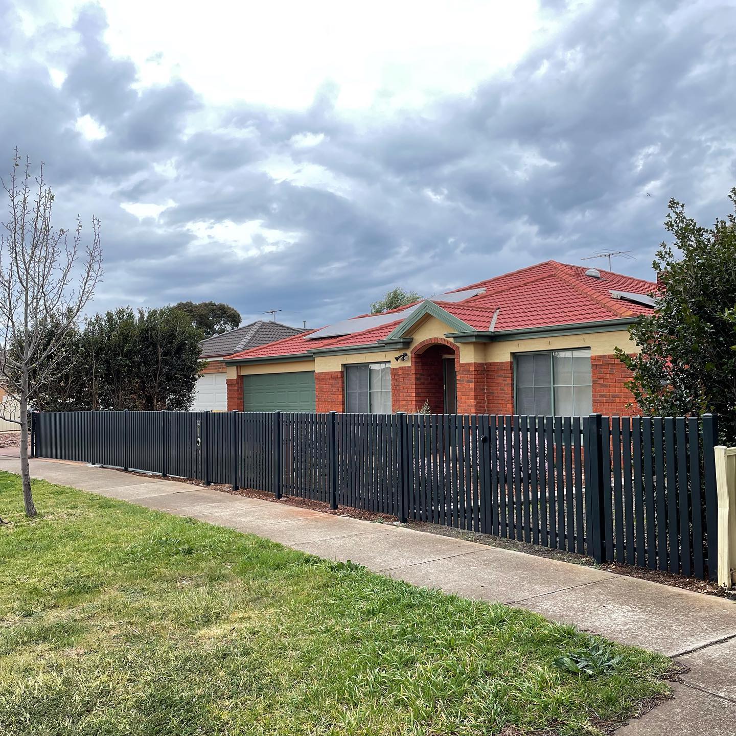 Charcoal satin-finished steel picket fence