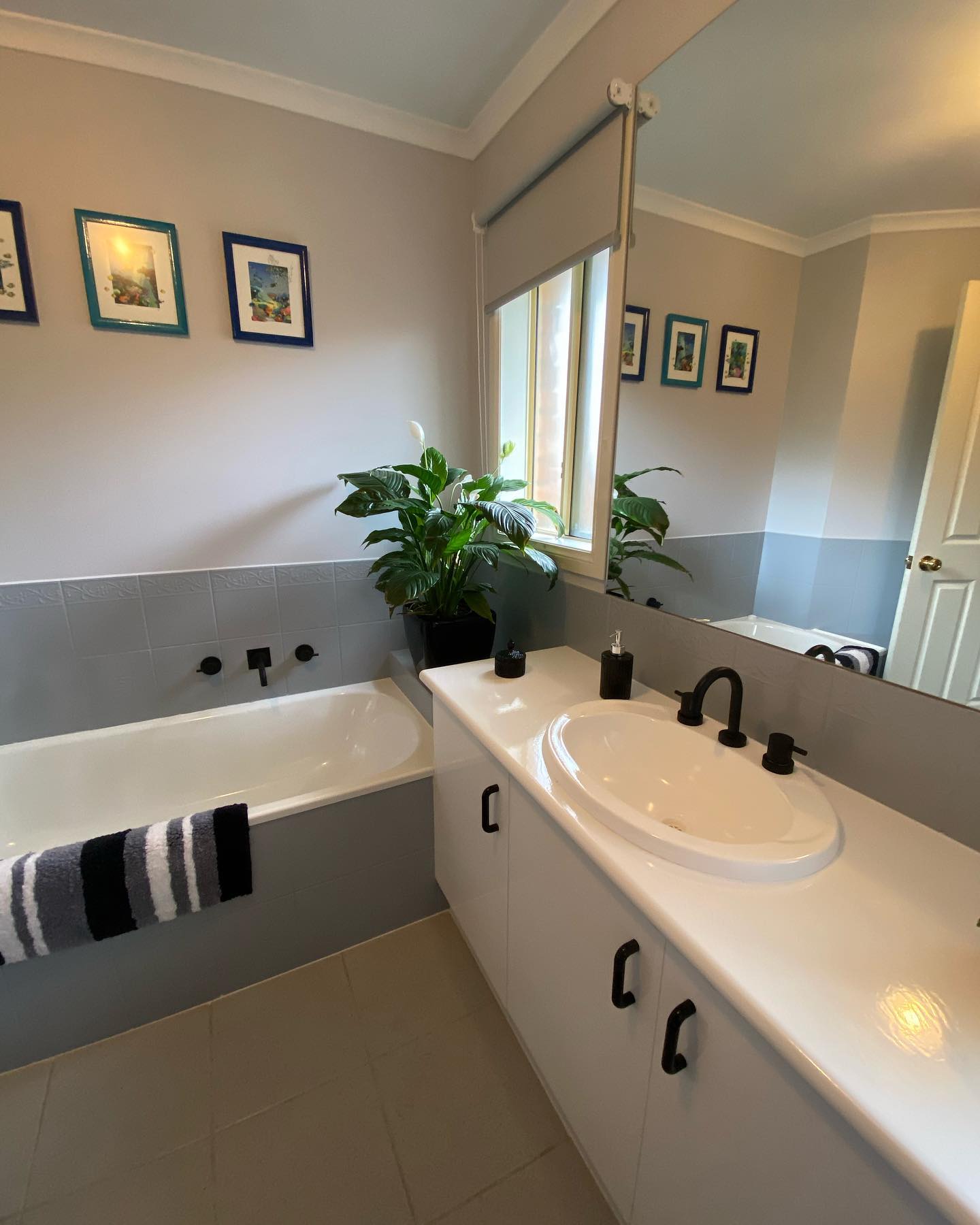Modern bathroom with custom resurfaced elements