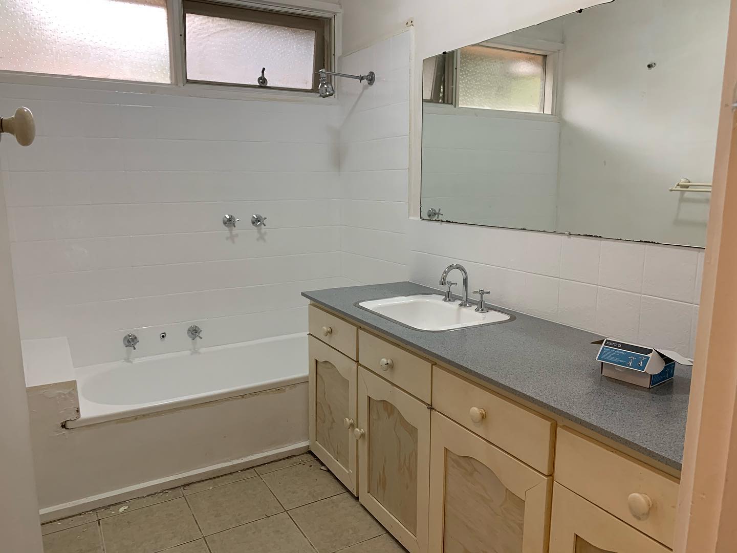 Bathroom after resurfacing with modern finishes