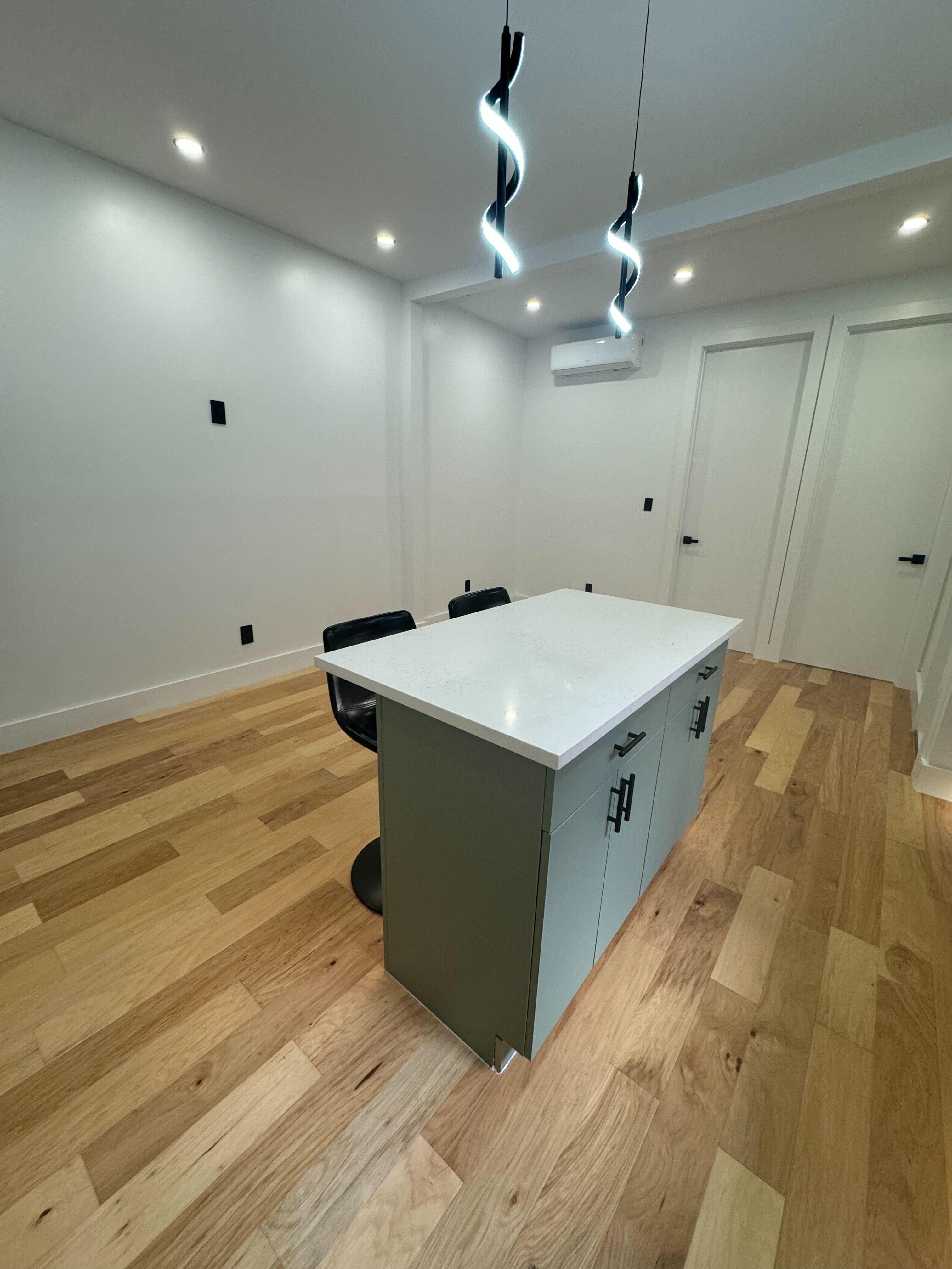 Modern basement interior with light wooden flooring