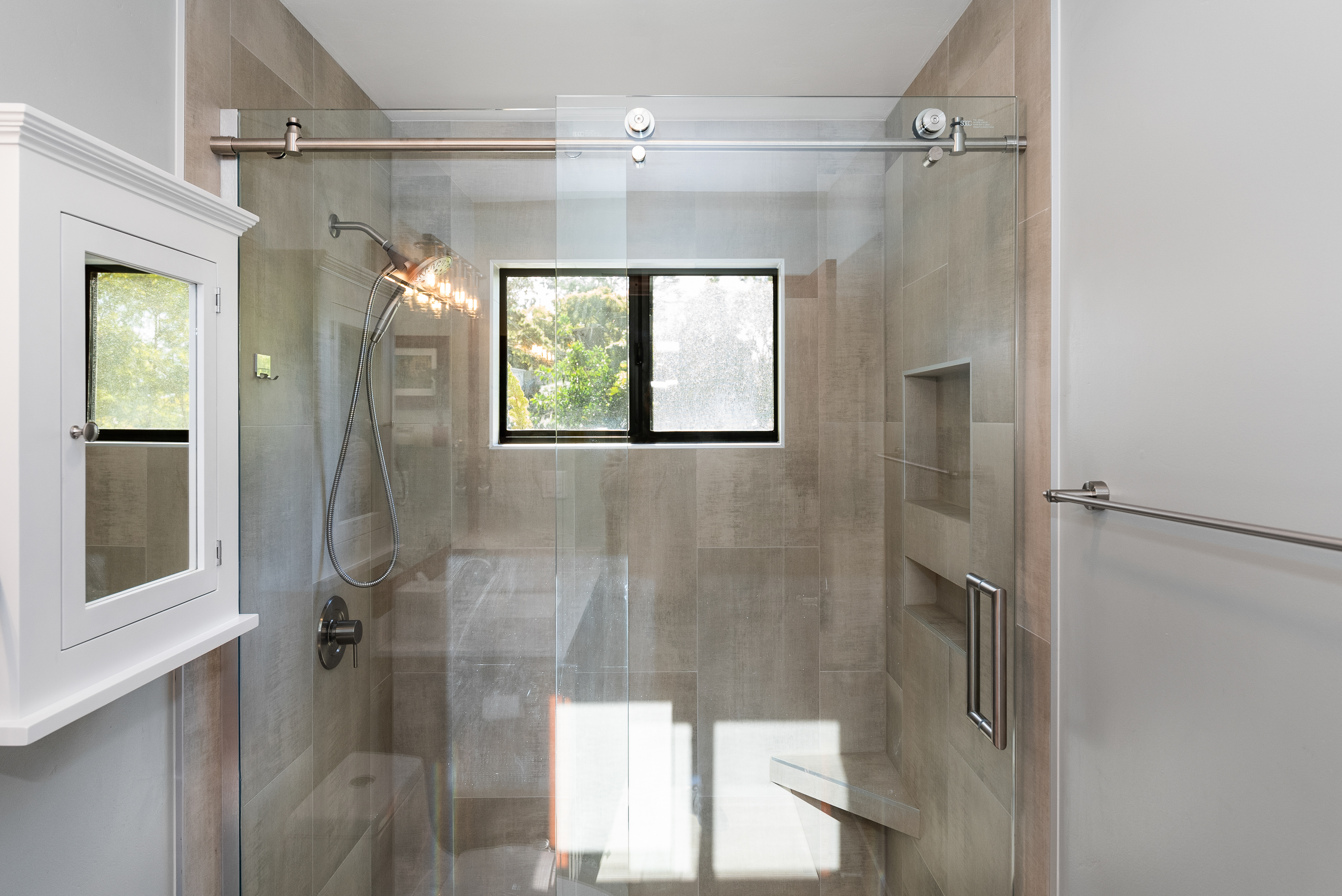 Modern bathroom with glass-enclosed shower area
