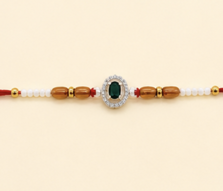 Emerald Crystal Rakhi with Premium Scroll Box & Roli Chawal Set