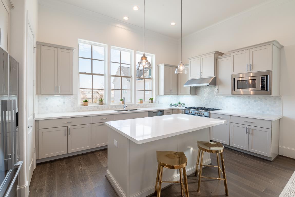 Eastwood Green Designer Kitchen with Large Island and Tall Windows