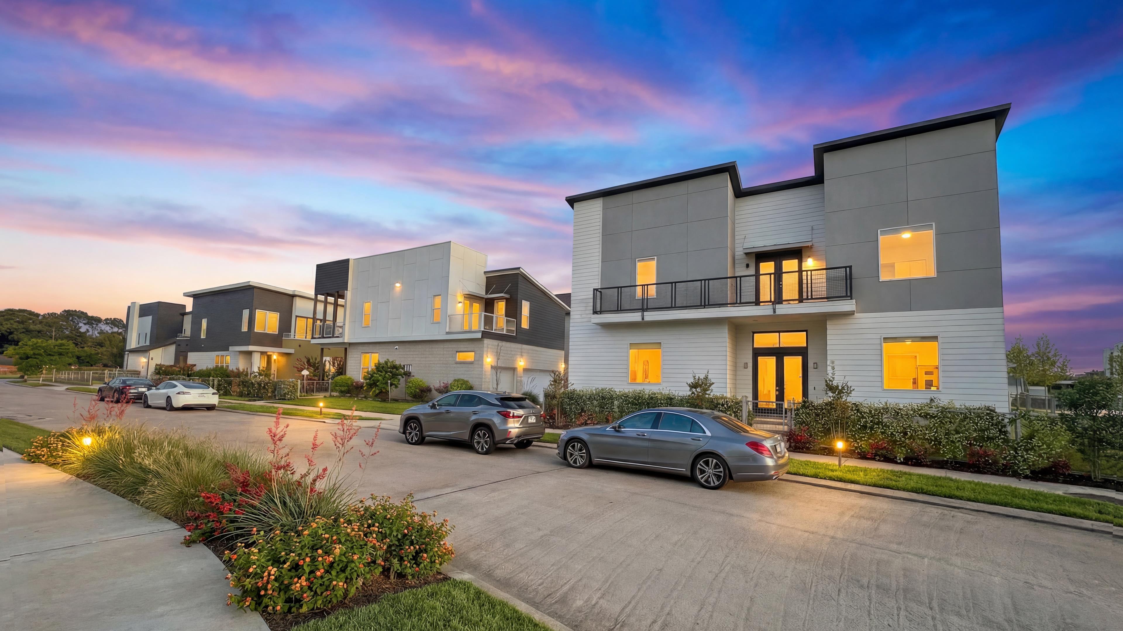 Avondale exterior street view with modern townhomes at sunset