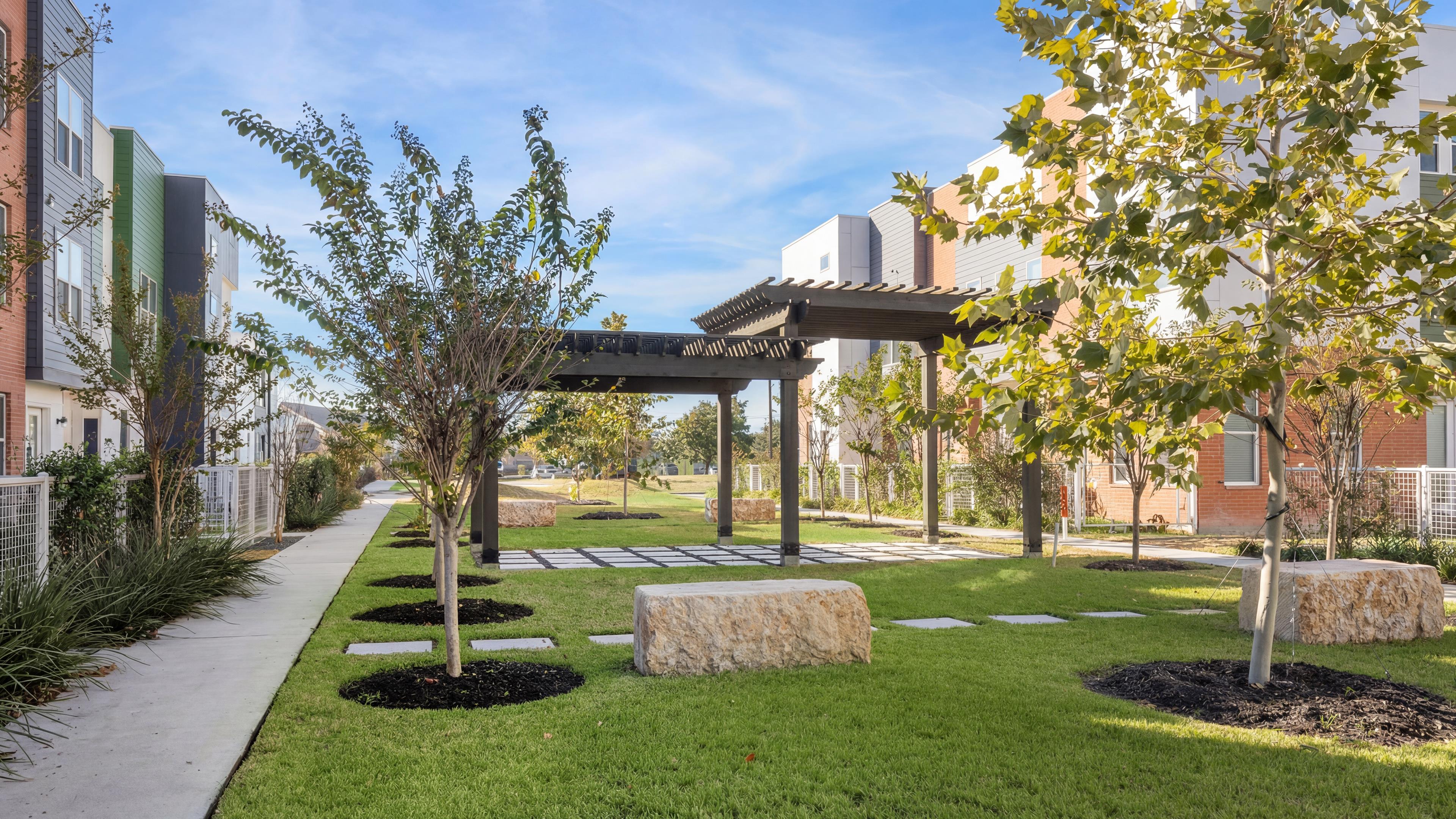 Avondale pocket park with pergola seating and landscaped lawn
