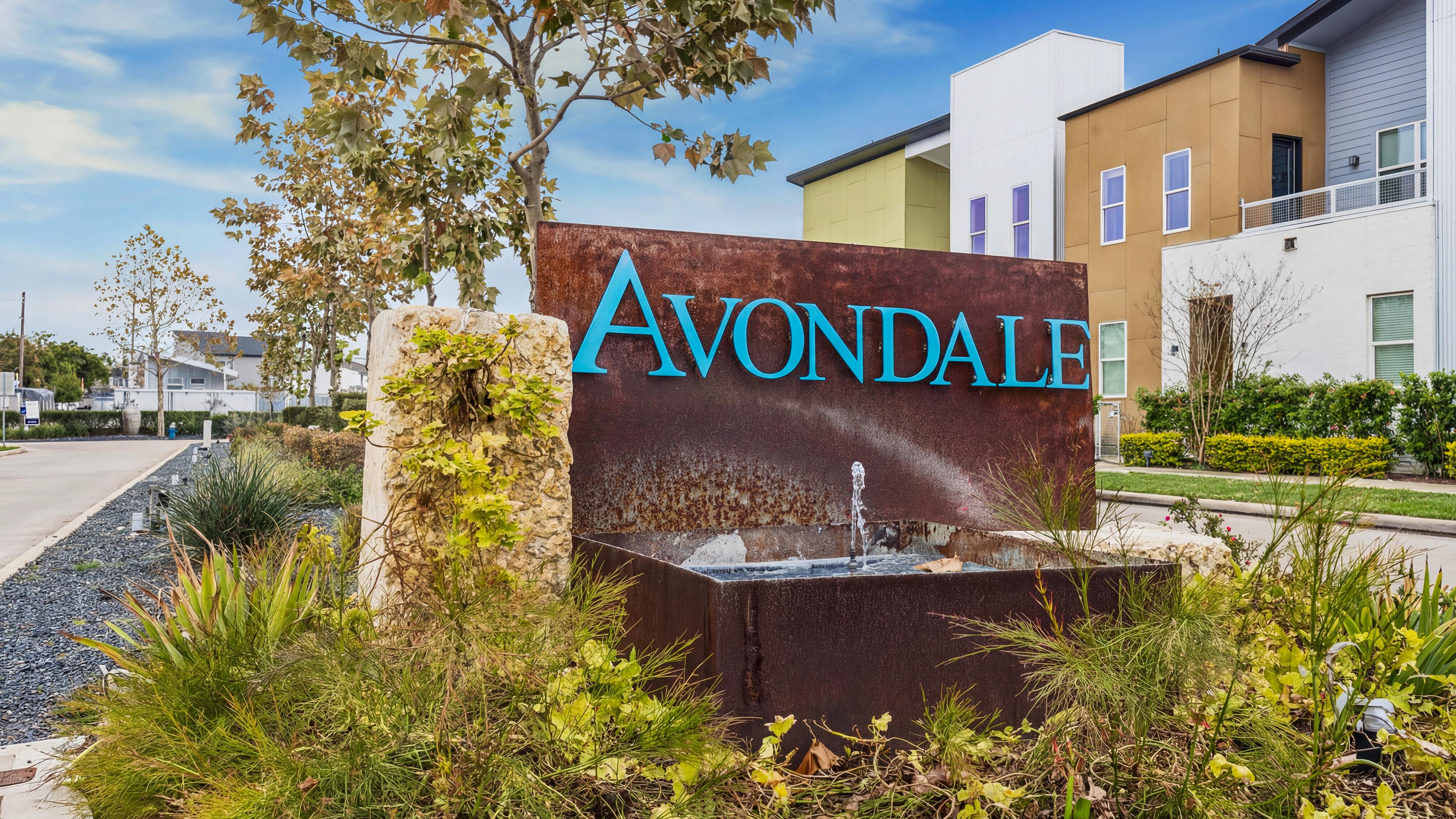 Avondale community entrance sign with landscaped fountain feature