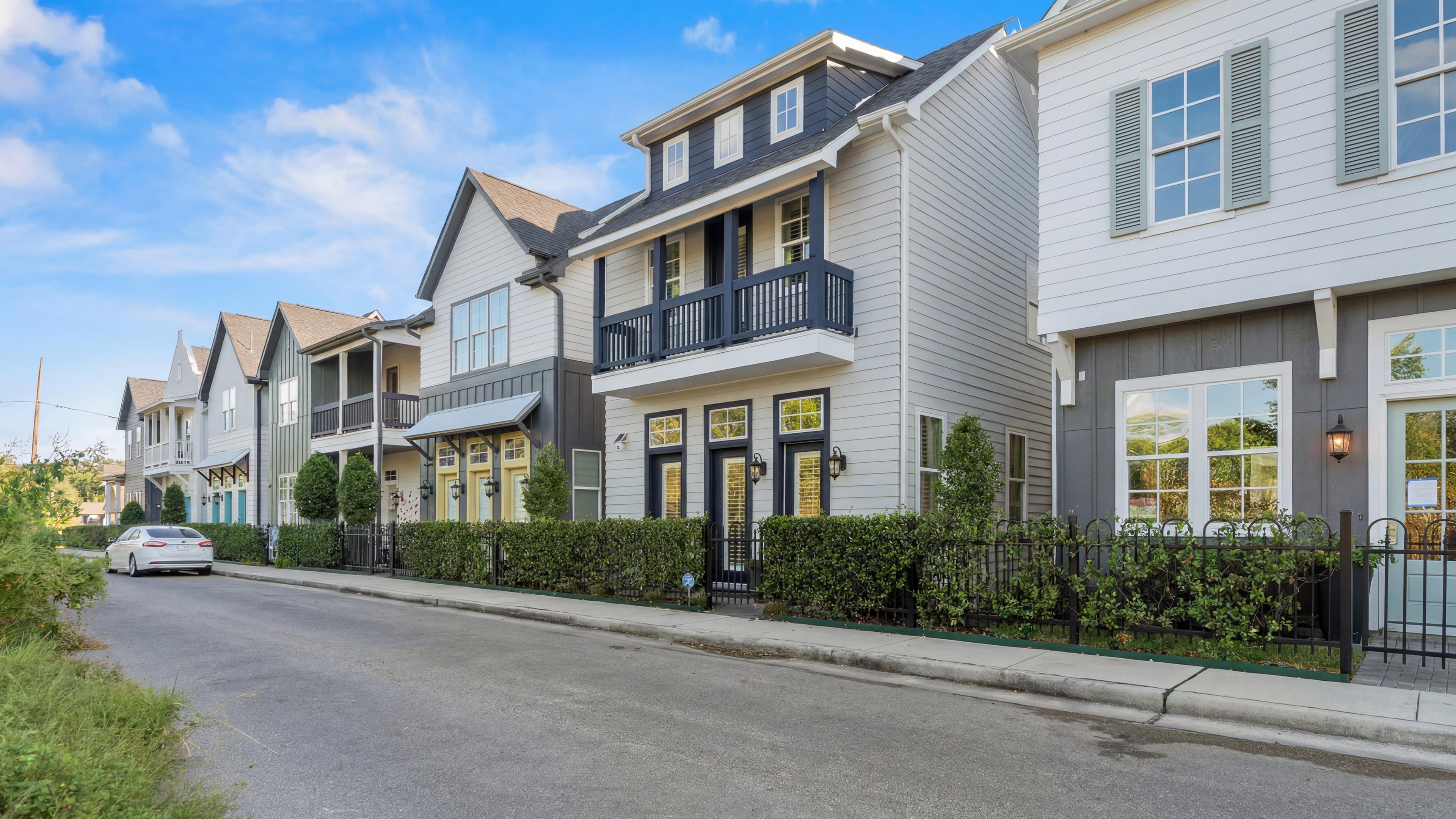 Eastwood Green Streetscape with Charming Homes and Front Balconies
