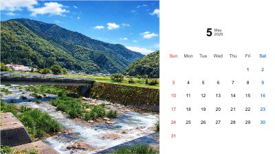 5月 山々に囲まれた川と橋、青空が広がる田園風景