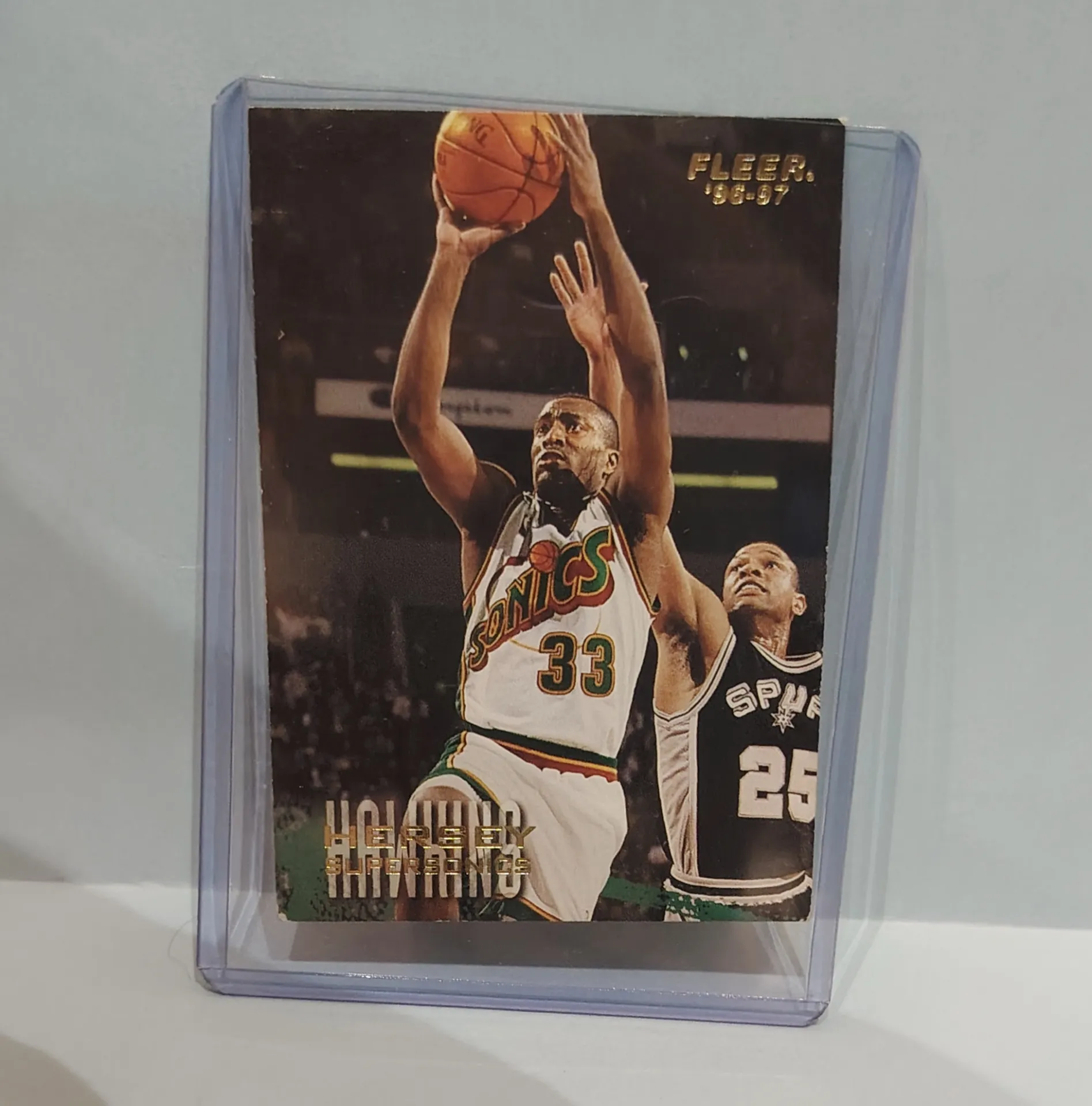 1986-87 Fleer Basketball Card #33 Seattle Supersonics + 1996-97 Fleer #101 Hersey Hawkins Seattle SuperSonics