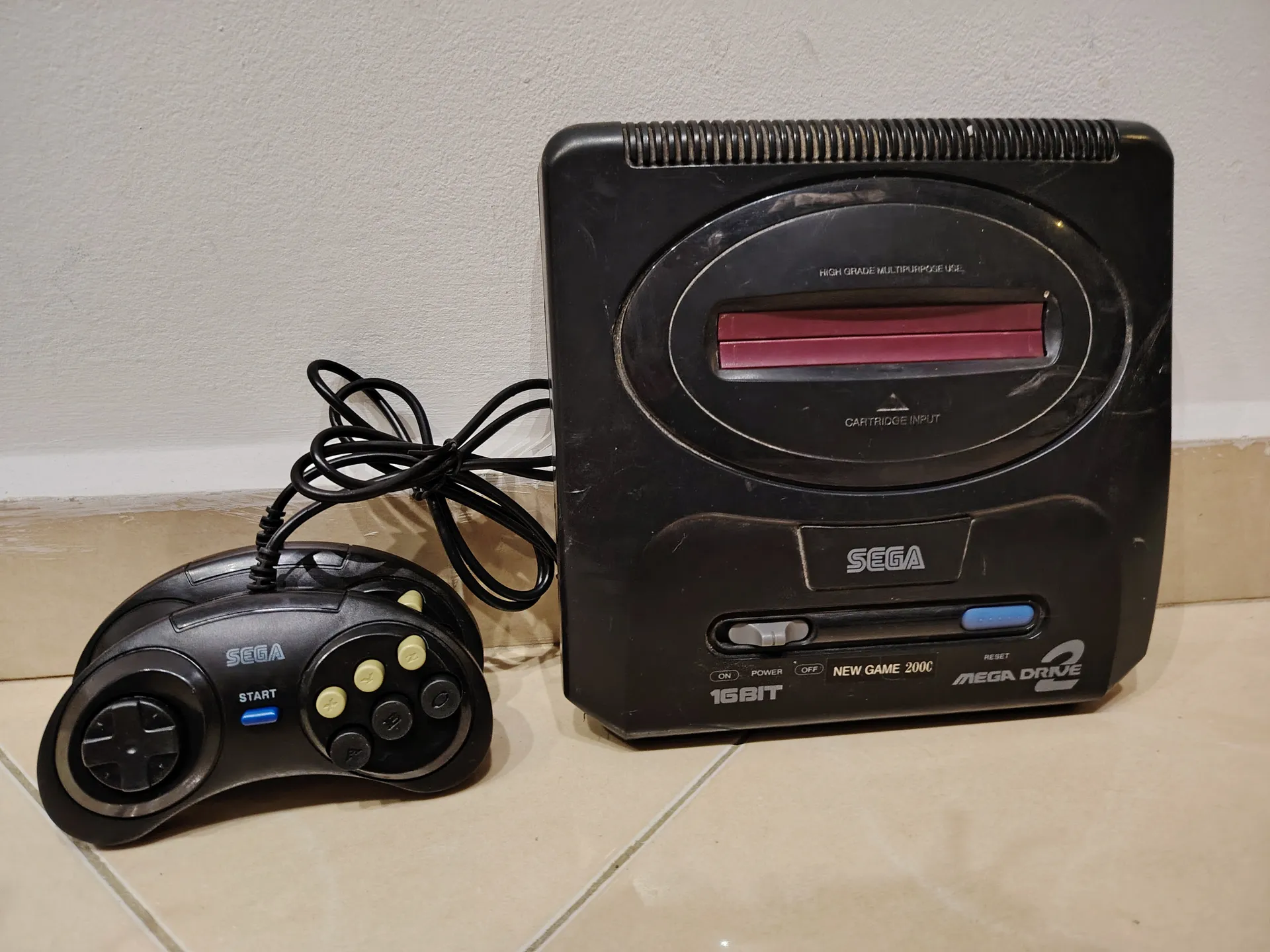 Sega Mega Drive 2 console with controllers and cables