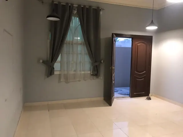 A large room and hall (two rooms, including a corridor), bathroom and comprehensive kitchen with split air conditioner, Al Kharaitiyat, 9-storey villa, ground floor inside the villa, 3300