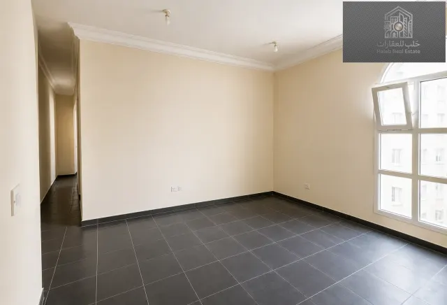 Well-located 2 bedroom unfurnished apartment in Madinat Khalifa Building 58