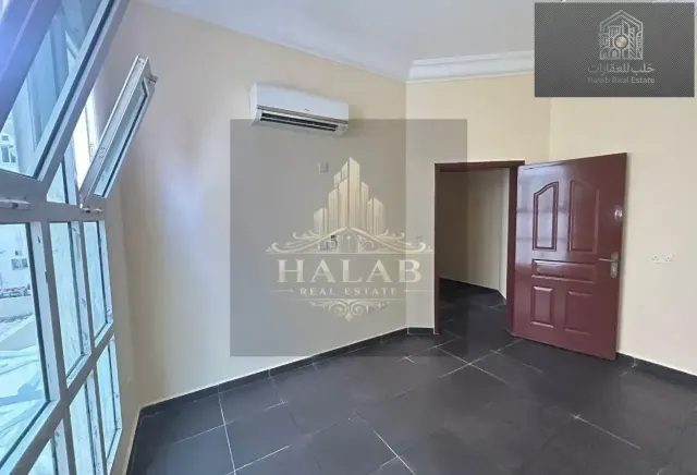 Well-located 2 bedroom unfurnished apartment in Madinat Khalifa Building 58
