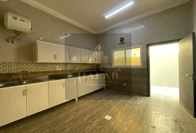 Villas for sale in a compound in Umm Al Amad, near