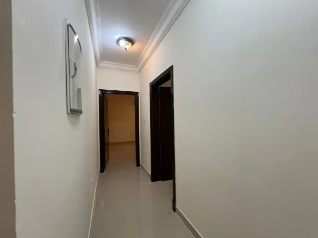 Charming 2-Bedroom Apartment for Rent in Bu Hamour - view 3