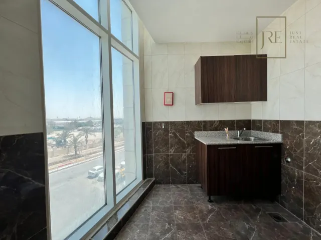 Semi-Fitted Shop Space for Rent in Al Mamoura Plaza | Prime Location + Parking