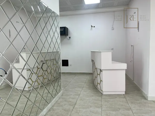 Semi-Fitted Shop Space for Rent in Al Mamoura Plaza | Prime Location + Parking