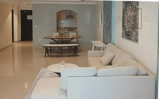 Fully Furnished 130 SQM Apartment in Porto Arabia | Balcony + Gym & Pool Access