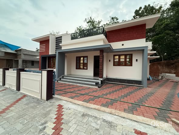 7 cents land and 1250 sqft House for sale at Kakkanad Muvattupuzha bus route,Ernakulam