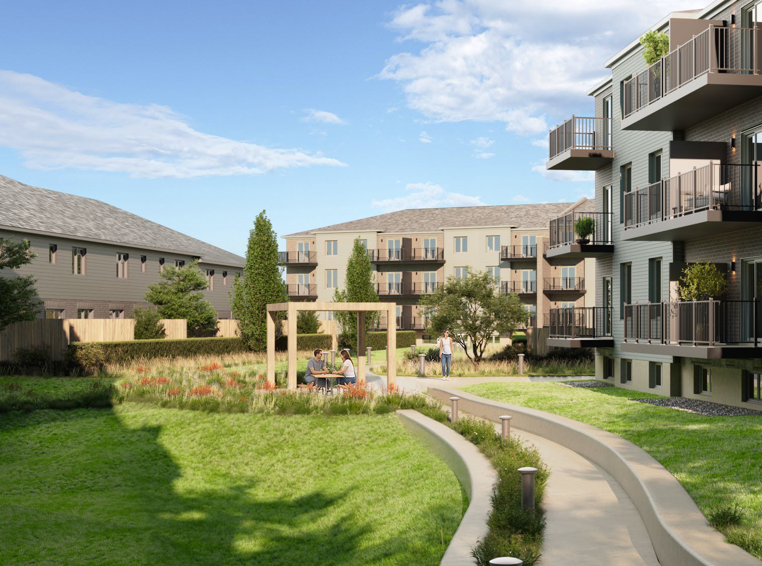 Rendering of the future stacked townhomes around a landscaped courtyard with a pergola and winding paths