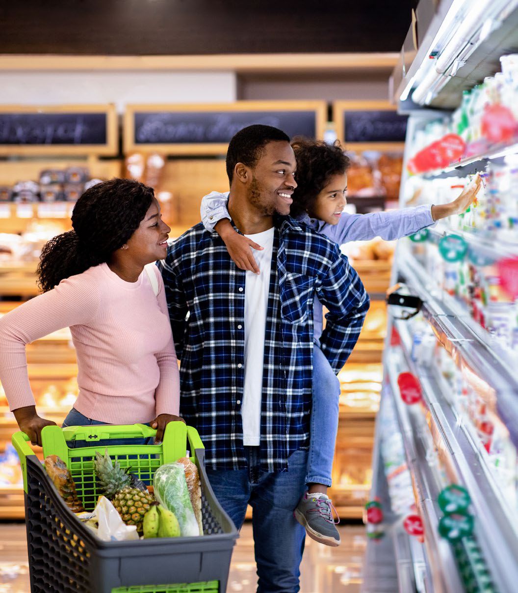 Family grocery shopping together