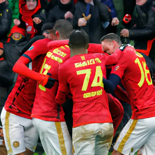 "Manchester United celebrating a goal in a Premier League match"