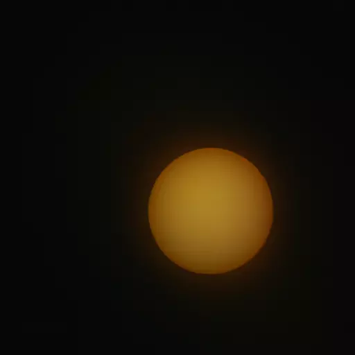 A photo of the sun with the closest planet visible