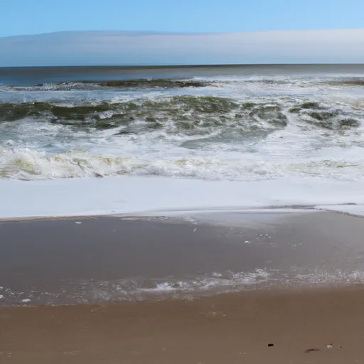 A picture of a beach and waves